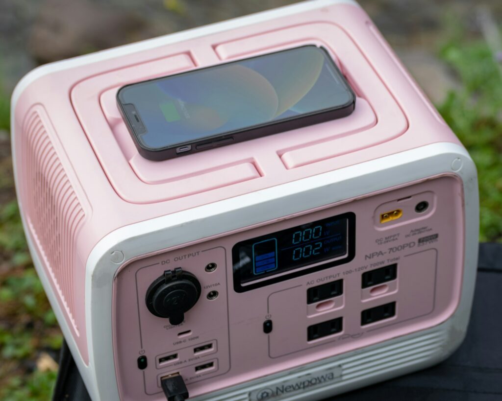 a pink handheld gaming device